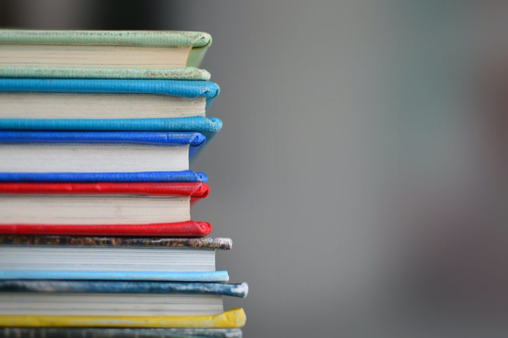 shallow focus photography of books